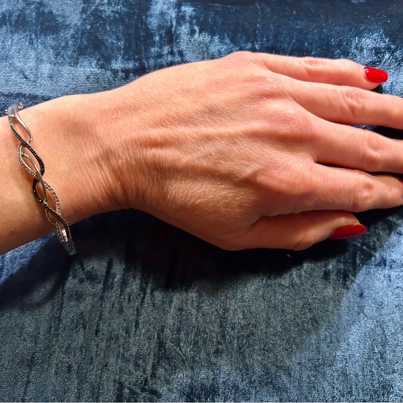 1/5 CT. T.W. Diamond Intertwined Petite Bangle in Sterling Silver - Picture 2 of 6